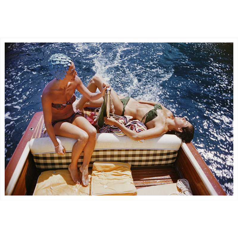 Vuccino And Rava Print by Slim Aarons, 32.5" H x 48.5" W x 0.1" D, Unframed Paper