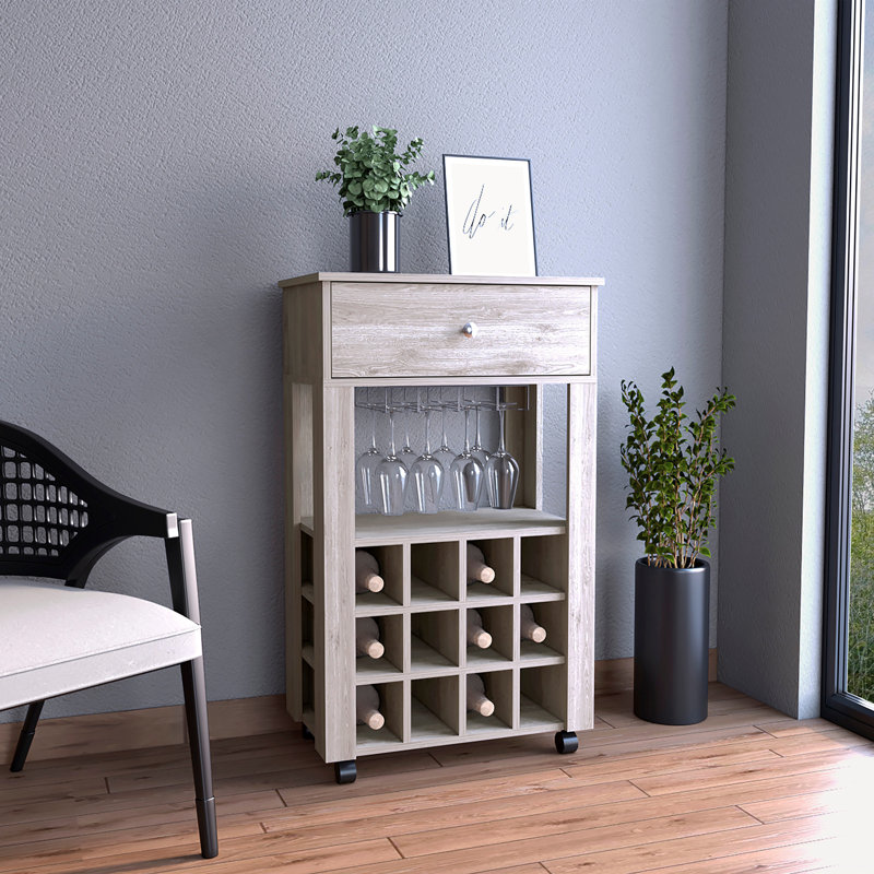 Chariot-bar Memphis, douze porte-bouteilles encastrés, quatre pieds, une tablette ouverte, Gris