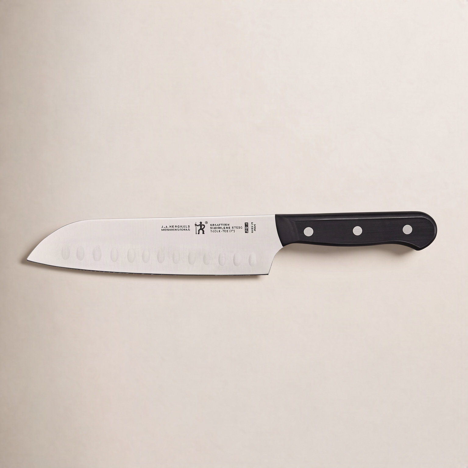 HENCKELS Solution 7" Hollow Edge Santoku Knife