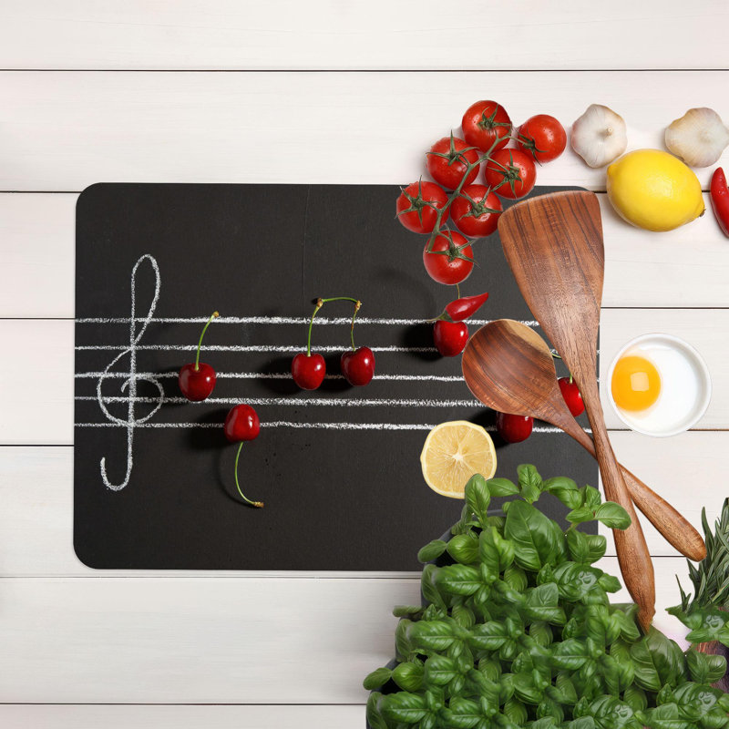 Conception de notes de musique sur un plateau de service en verre d'aspect cerise, idéal pour les amateurs de musique qui apprécient les ustensiles de cuisine artistiques