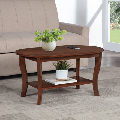 Carbin 36" Oval Coffee Table with Shelf