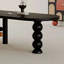 Table de salle à manger noire en bois massif demi-lune-939680315