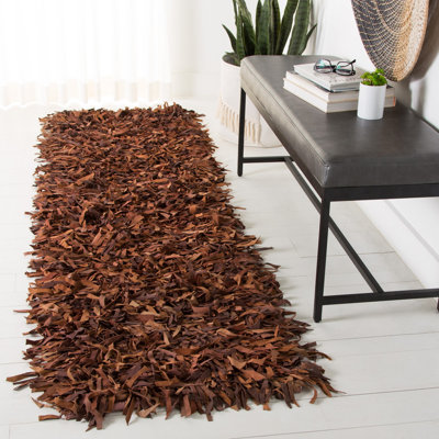 Arik Handwoven Leather/Cotton Solid Color Rug in Saddle