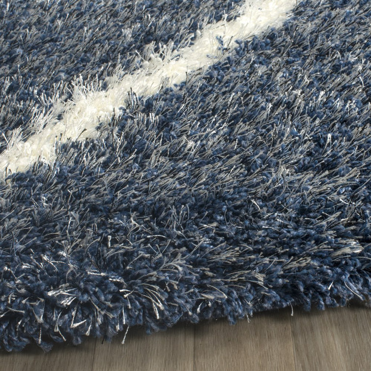 Amhold Geometric Blue Area Rug