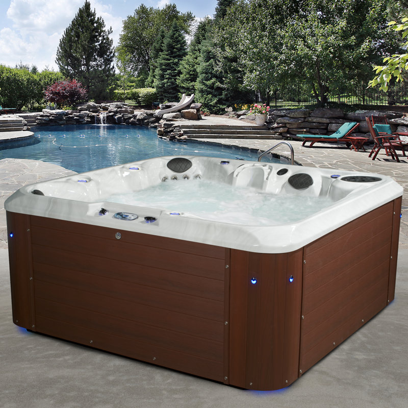 Amplified™ 6-Person 100-Jet Double-Lounger Hot Tub Spa with Bluetooth Stereo, 3 Pumps, LED Lighting, Stainless Steel Heater and Ozonator, Insulated Cover and Steps Included