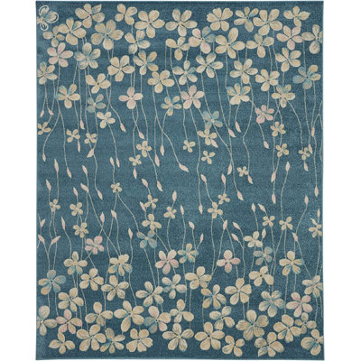 Tapis bleu turquoise à motif floral Zaizi