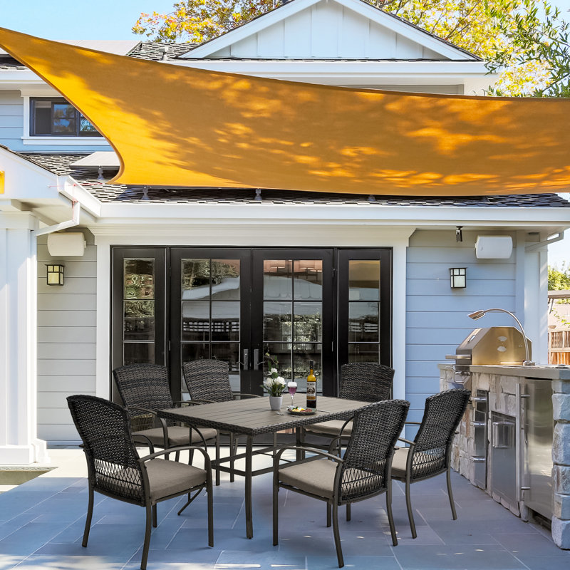 Hainer 6 - Person Wicker Patio Dining Set with Rectangular Table , Cushions Included, Brown