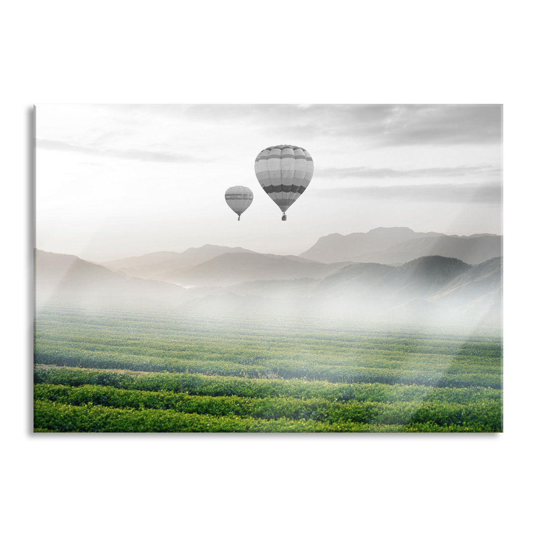 Glasbild Heißluftballon Landschaft