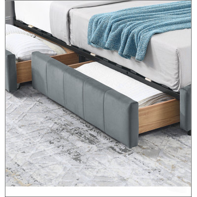 Lit double capitonné avec rangement, dossier, accoudoirs et revêtement en velours gris, au design confortable comme un canapé.