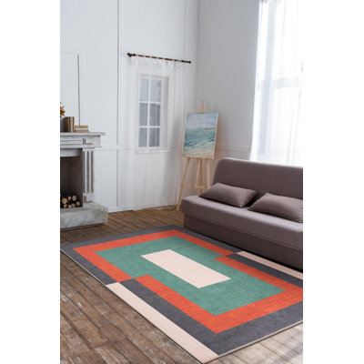 Tapis décoratif rayé rouge, noir et vert