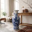 Vase de sol en porcelaine bleue et blanche à motif floral des Quatre Saisons