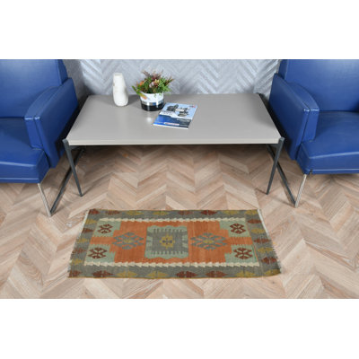 Handwoven Small Turkish Kilim With Geometric Oushak Pattern in Vibrant Orange Suitable for Entryway or as Bath Mat