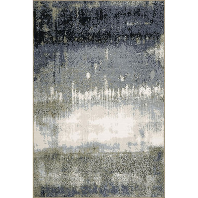 Tapis bleu délavé à motif abstrait et créatif