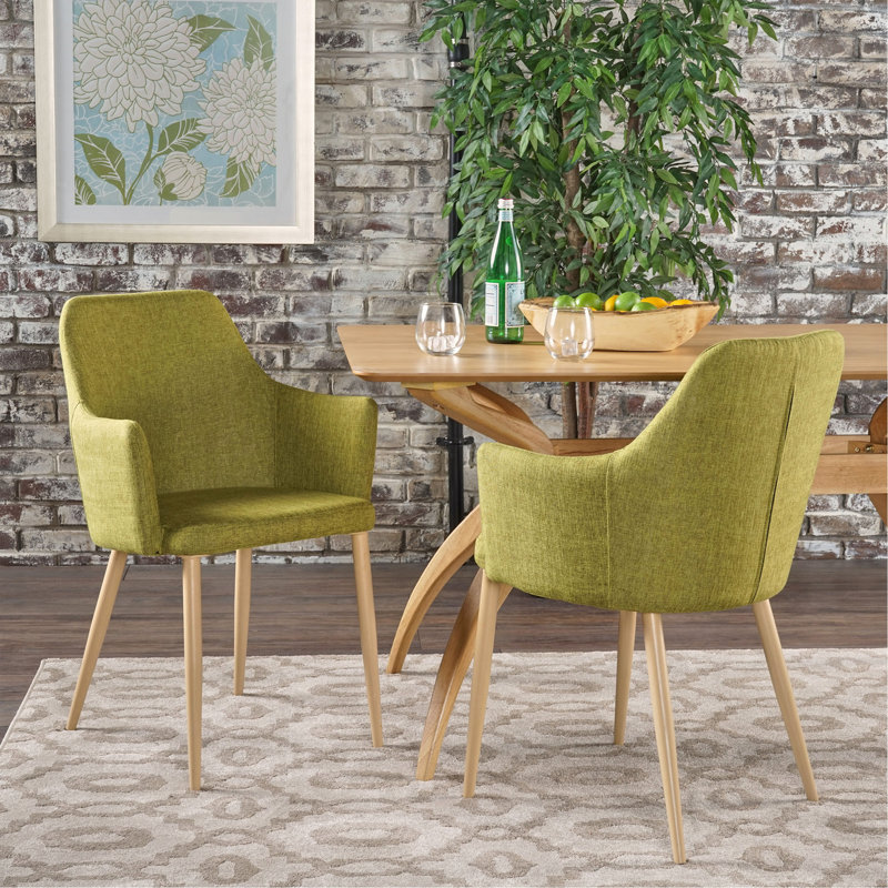 Chaise de salle à manger à soutien profilé avec tissu de haute qualité et structure en fer durable, parfaite pour les intérieurs modernes et peu encombrants.