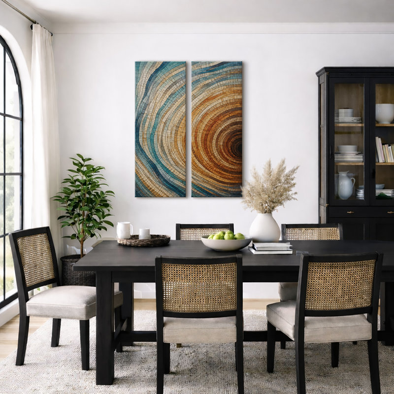 Ensemble de 2 tableaux encadrés sur toile, motif géométrique abstrait moderne à anneaux concentriques bleus et oranges (32 po x 12 po x 2 po).