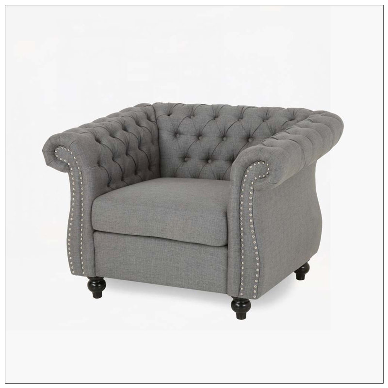 Fauteuil club capitonné