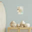 Plaque murale Coral Branch & Cowrie Shells, design par Susan Arnot
