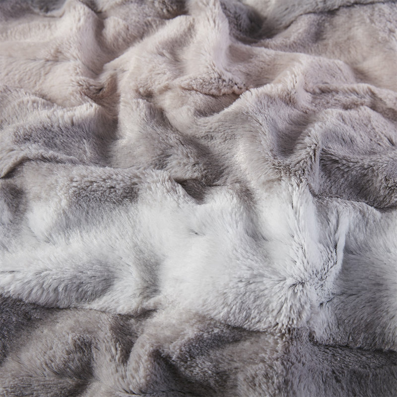 Jeté en fausse fourrure luxueusement doux, Gris