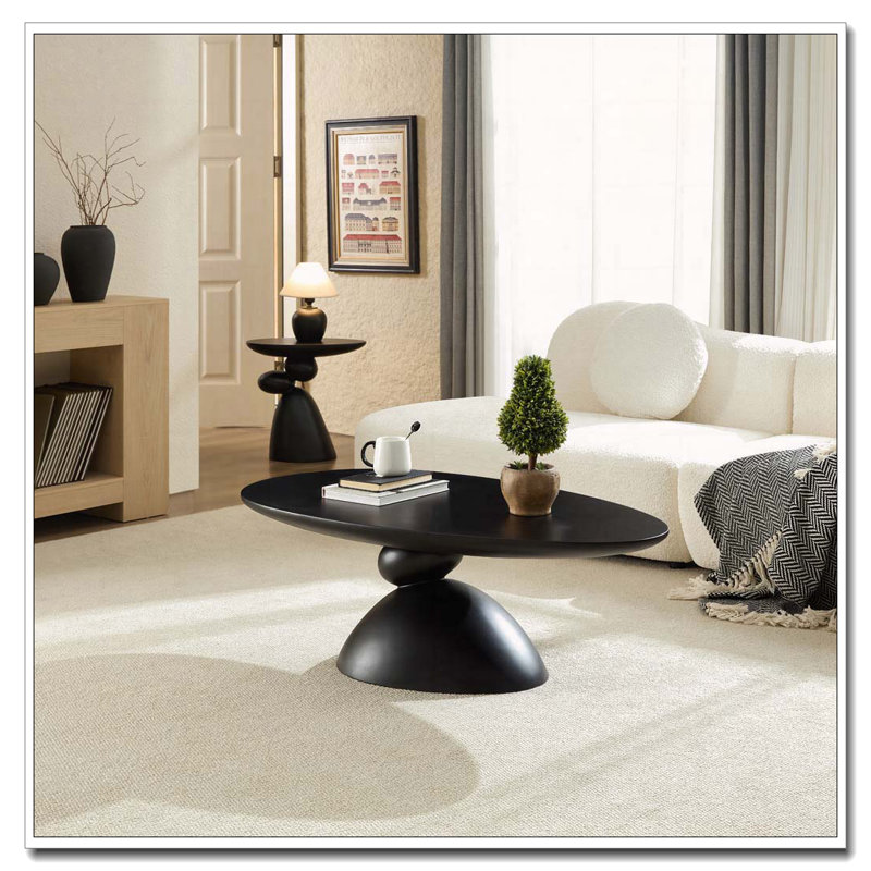 Table basse ovale en fibre de verre 47,27 "avec base sculpturale, Noir