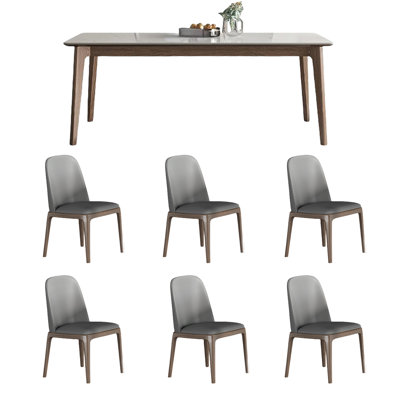 Ensemble de table et chaises de salle à manger moderne avec dalle de roche.