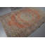Tapis turc rétro avec look et motifs floraux uniques en orange vif et bleu