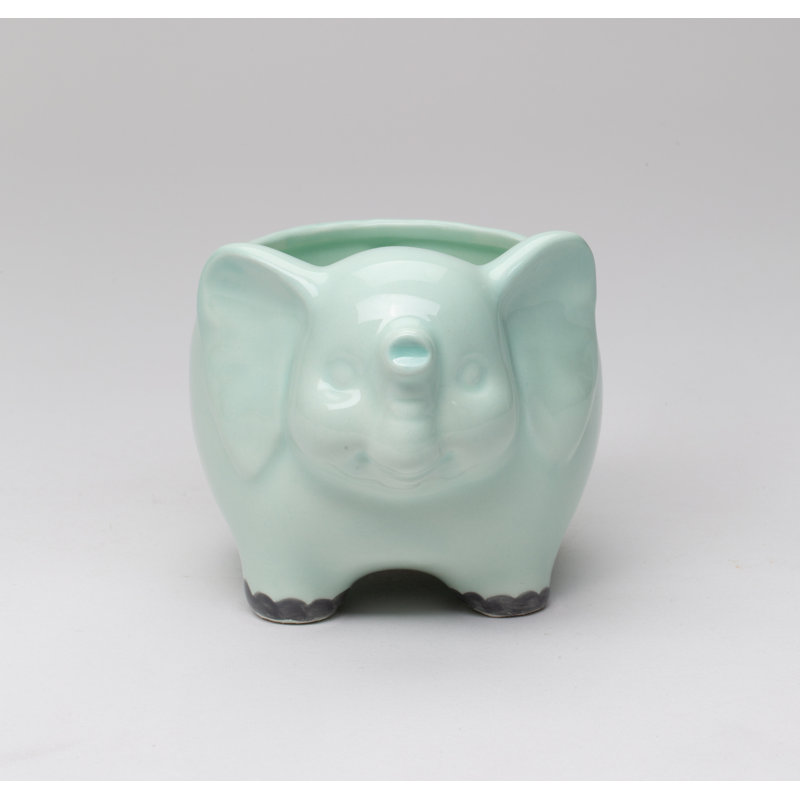 Petit pot de fleurs vert éléphant