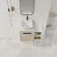 Meuble-lavabo flottant de 36 po au design moderne avec lavabo d'art en céramique, dalle de pierre plate blanche et petites tablettes de rangement, porte à fermeture douce