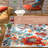 TOWN & COUNTRY EVERYDAY Hibiscus Bloom Modern Floral Outdoor Rug Ivory/Red/Blue-97549325