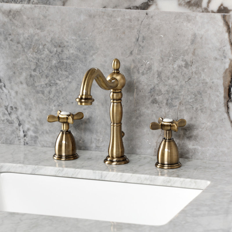 Kingston Brass Essex Two-Handle 3-Hole Deck Mount Widespread Bathroom Faucet with Pop-Up Drain, Antique Brass