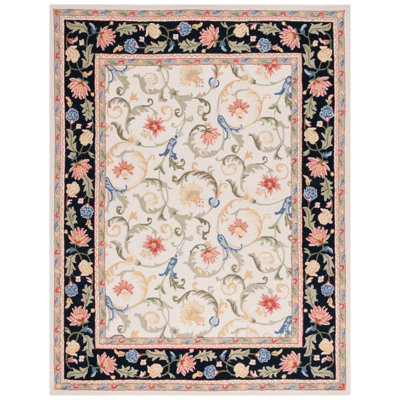 Oxfordshire Hand Tufted Wool/Cotton Floral Rug in Black/Ivory