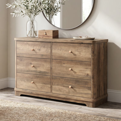 Commode 6 tiroirs avec base sculptée Burkhart
