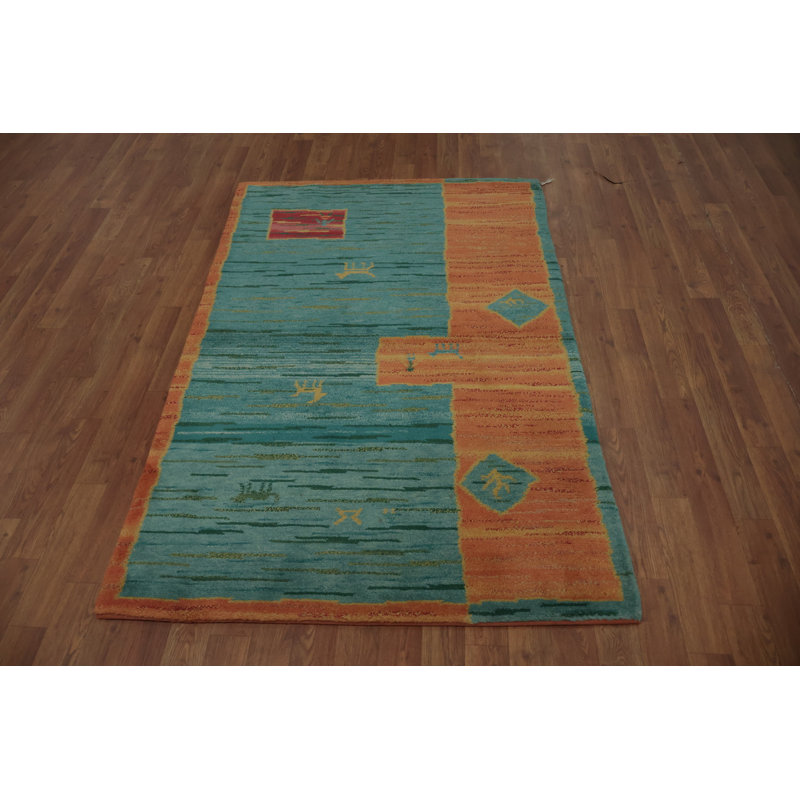 Tapis traditionnel vibrant Gabbeh 4 x 6 avec motifs d'animaux tribaux