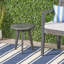 Table d'appoint d'extérieur - Table de bout en bois gris foncé de style marina. Dessus massif, carré de 15,44 po, poids de 5,52 lb, base à trois pieds en gris. Design moderne, capacité ronde de 50 lb