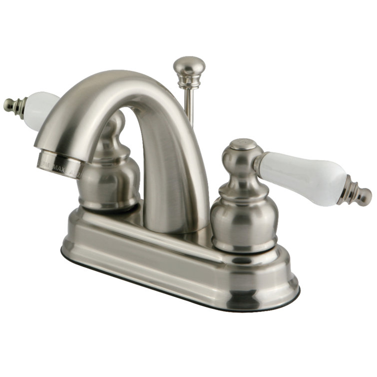 Kingston Brass Restoration Two-Handle 3-Hole Deck Mount 4" Centerset Bathroom Faucet with Plastic Pop-Up