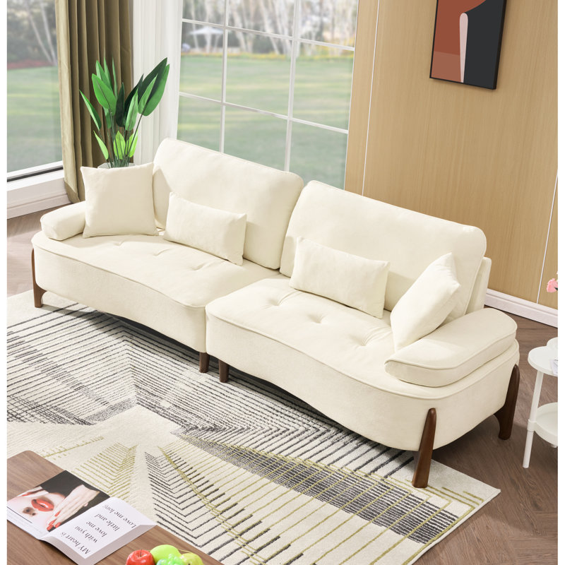 Canapé confortable à assise profonde avec coussin moelleux, idéal pour divers espaces