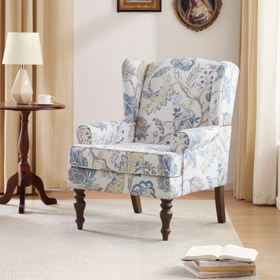 Fauteuil à oreilles rembourré Damiyah