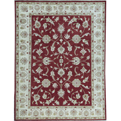 Tapis rouge et ivoire noué à la main de haute qualité