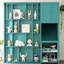 Lit simple bleu sarcelle rotatif avec plan de rangement pour bibliothèque, solution de rangement pour armoire supérieure, surface de travail escamotable et compartiments latéraux à l'ombre, bibliothèque intégrée, boîte dissimulée intégrée, zone extensible