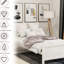 Lit plateforme simple en bois massif avec tête de lit élégante, blanc