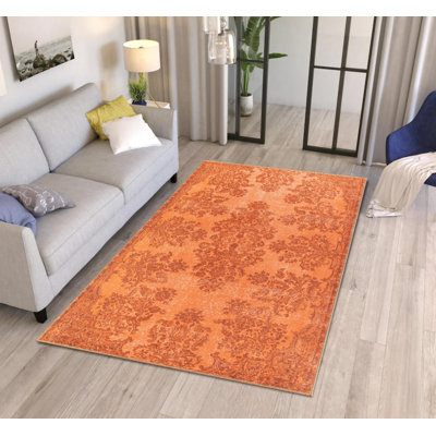 Tapis décoratif orange à motif tissé rétro