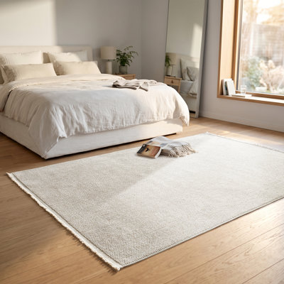 Tapis texturé à franges