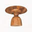 Table basse sur piédestal en bois sculpté