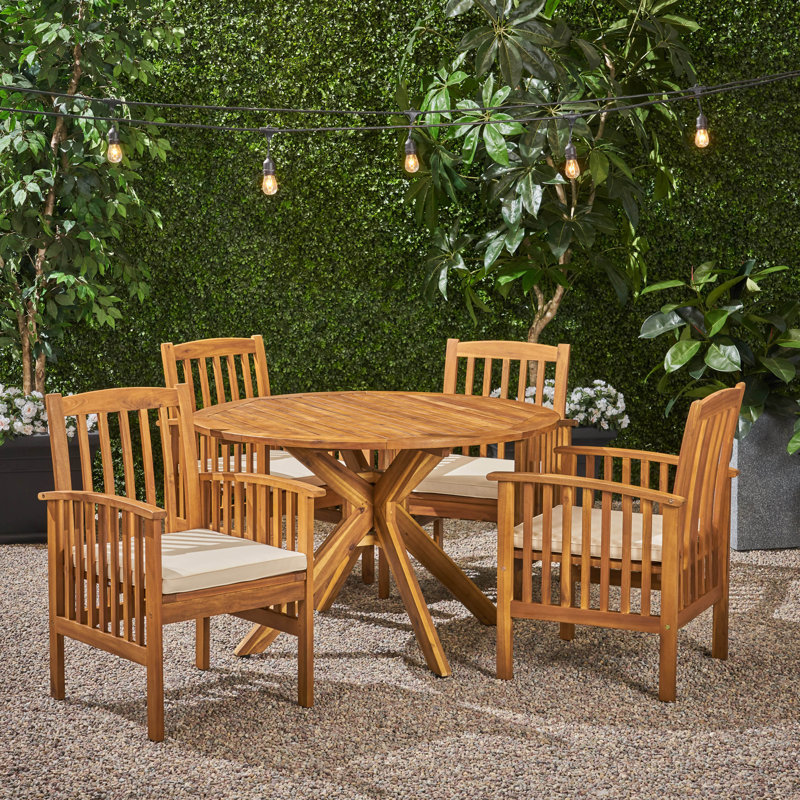 Soares 4 - Person Acacia Wood Patio Dining Set with Round Table , Cushions Included