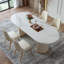 Table de salle à manger blanche et blanche en pierre frittée ovale et cristal