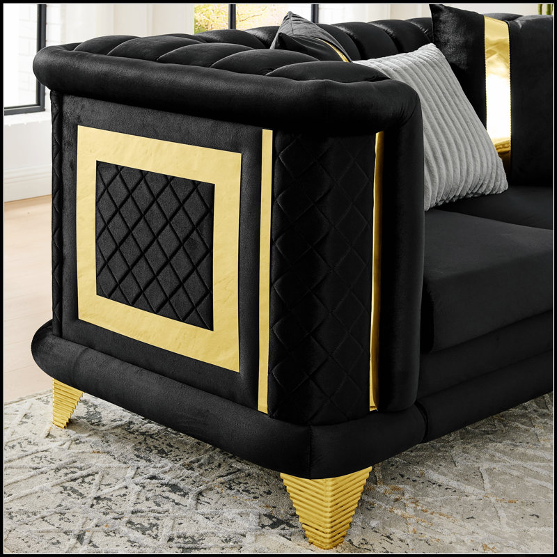 Canapé luxueux deux places en velours capitonné avec des accents métalliques et une texture brodée pour une décoration de salon élégante