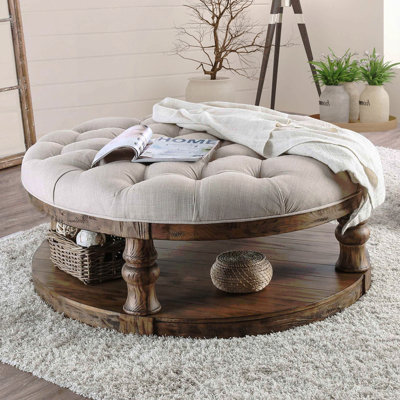 Table basse ronde en bois de style rustique avec pieds tournés et tablette ouverte