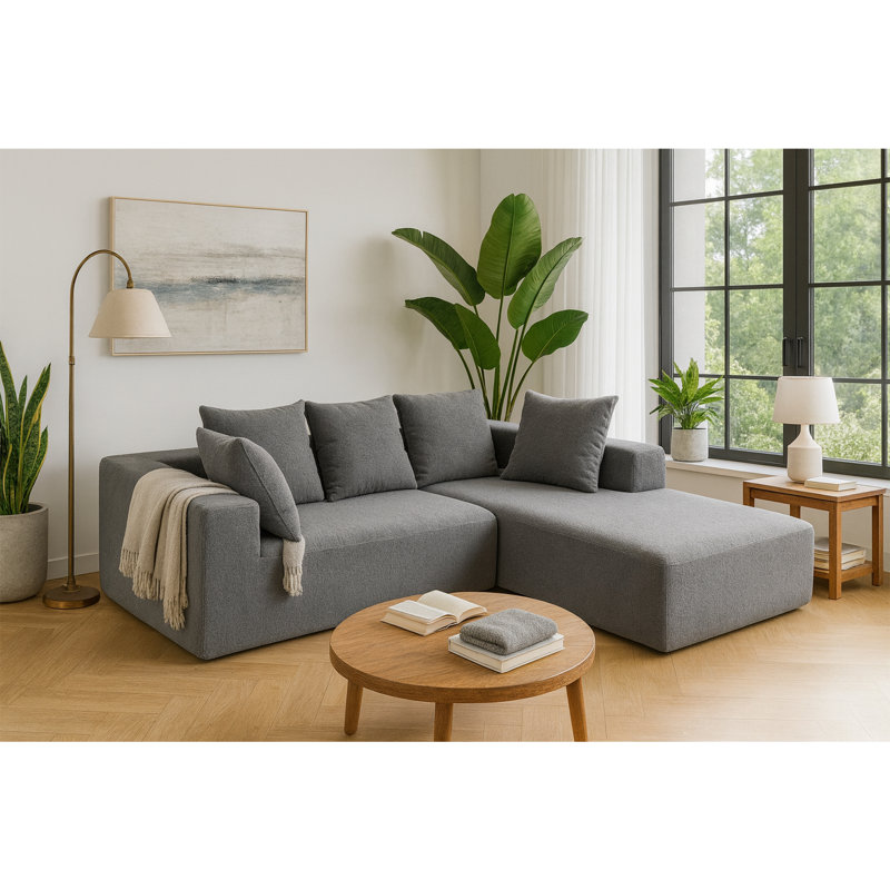 Canapé modulaire moderne, revêtement gris-bleu moelleux, conception modulaire pour la vie familiale