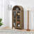 A high arched storage cabinet with a lamp-360005112