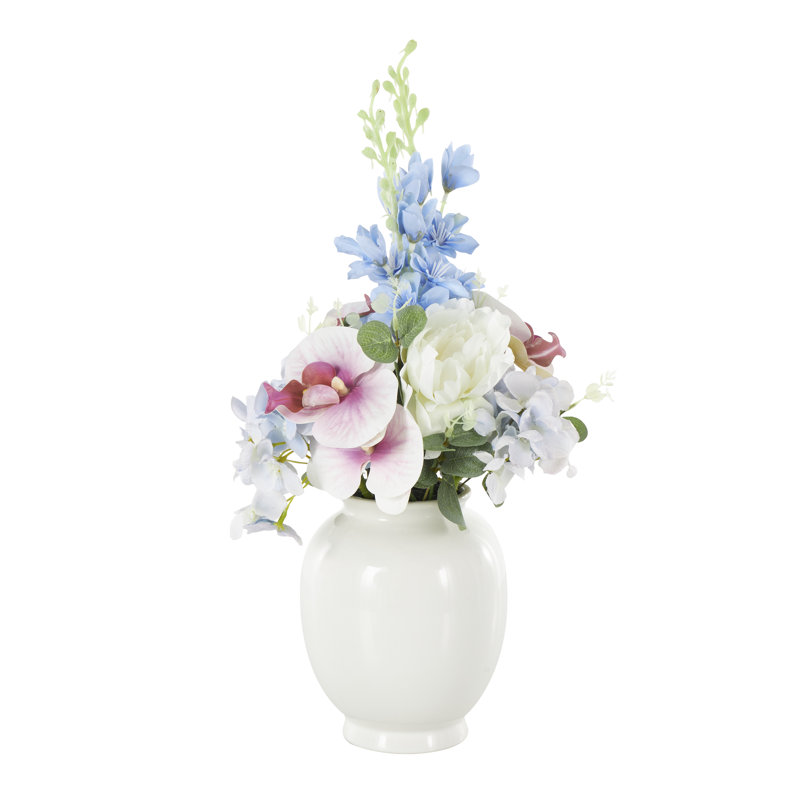 Cole et feuillage naturel en tissu gris avec feuilles vertes et vase rond en céramique