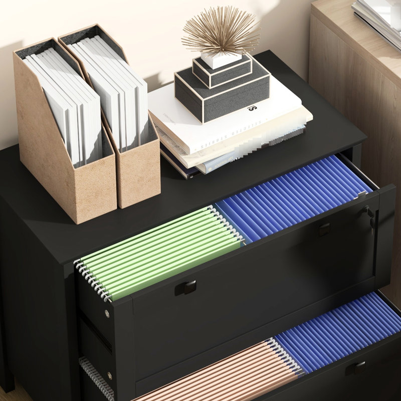 Black 2 Drawer File Cabinet For Home Office. Secure With Lock. Fits Different Sizes. Functional And Stylish. -Coated Particleboard Build. 31.1" L X 15.7" W 28.3" H. 132 Lbs Capacity. Assembly